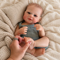 BabyWell 18-Inch Realistic Reborn Baby Boy Doll, Full Body Soft Vinyl, Lifelike Newborn Doll with Hand-Painted Hair & Realistic Details